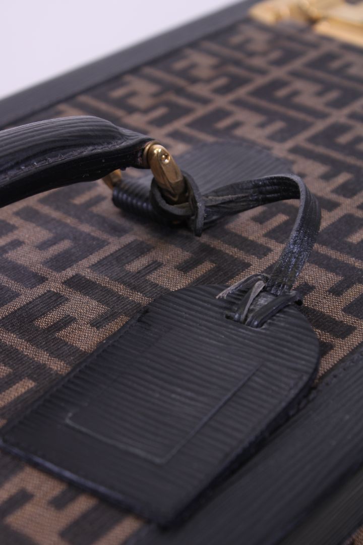 Fendi trunk brown monogram L