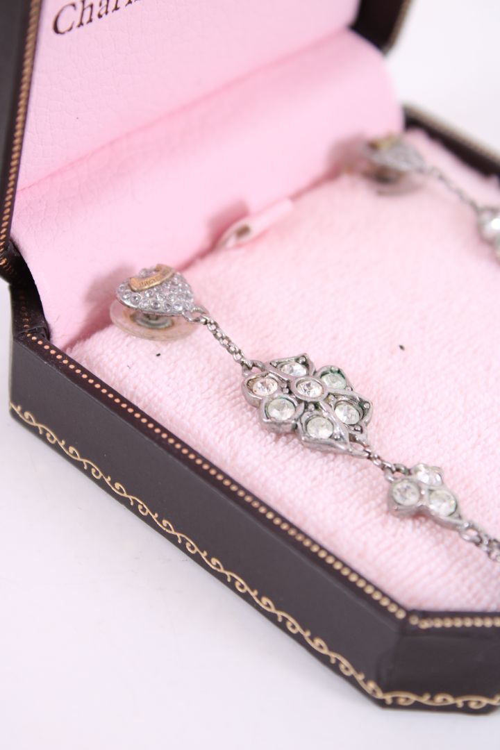 Juicy Couture long diamante flower earings Silver