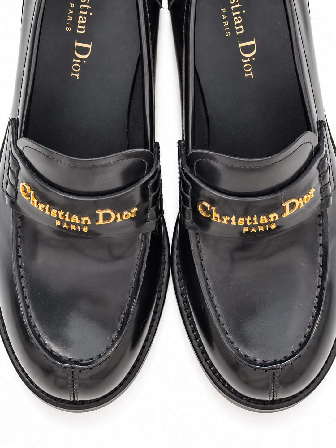 Christian Dior black loafers, gold branding and toe detail