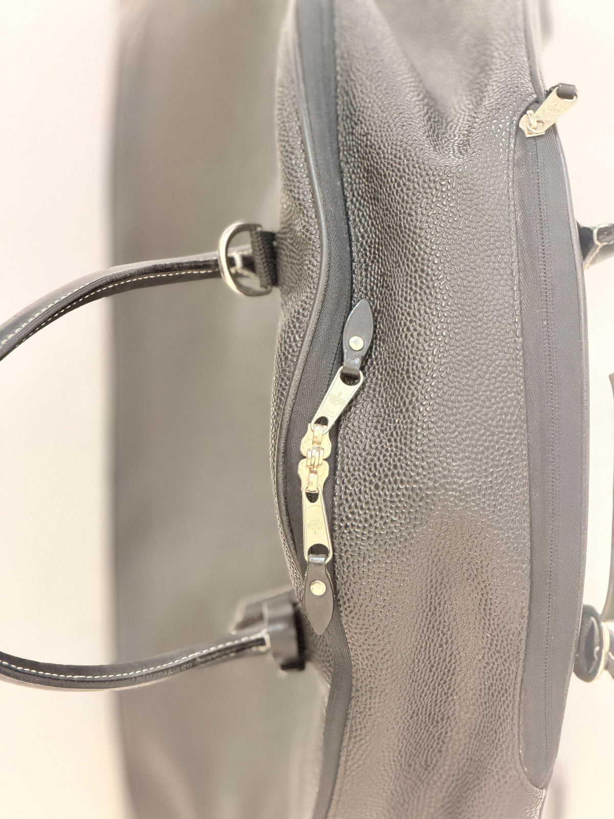 Mulberry black Scotchgrain suit carrier, close-up of the zip