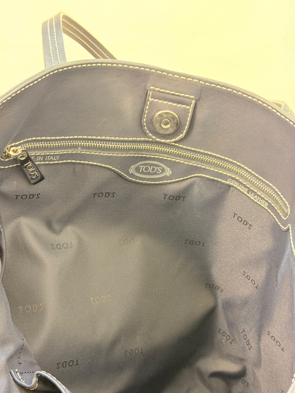 Tod’s tote interior lining, label and zip pocket