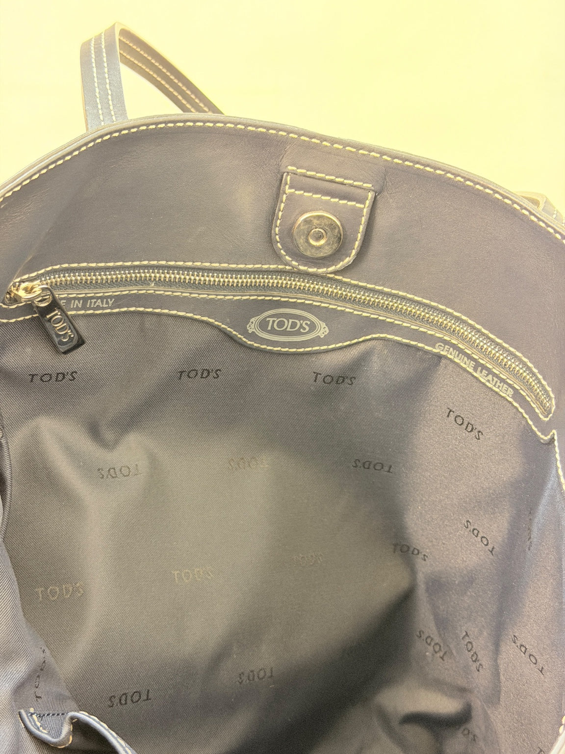Tod’s tote interior lining, label and zip pocket